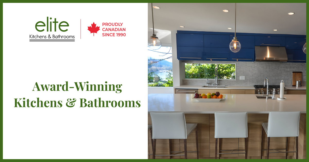 An inviting kitchen design by Elite Kitchens & Bathrooms of Maple Ridge BC, featuring a modern island with seating and a stunning view.