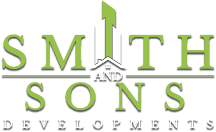 The Smith and Sons Developments logo features green lettering and modern architectural elements, possibly representing developments in Maple Ridge BC.